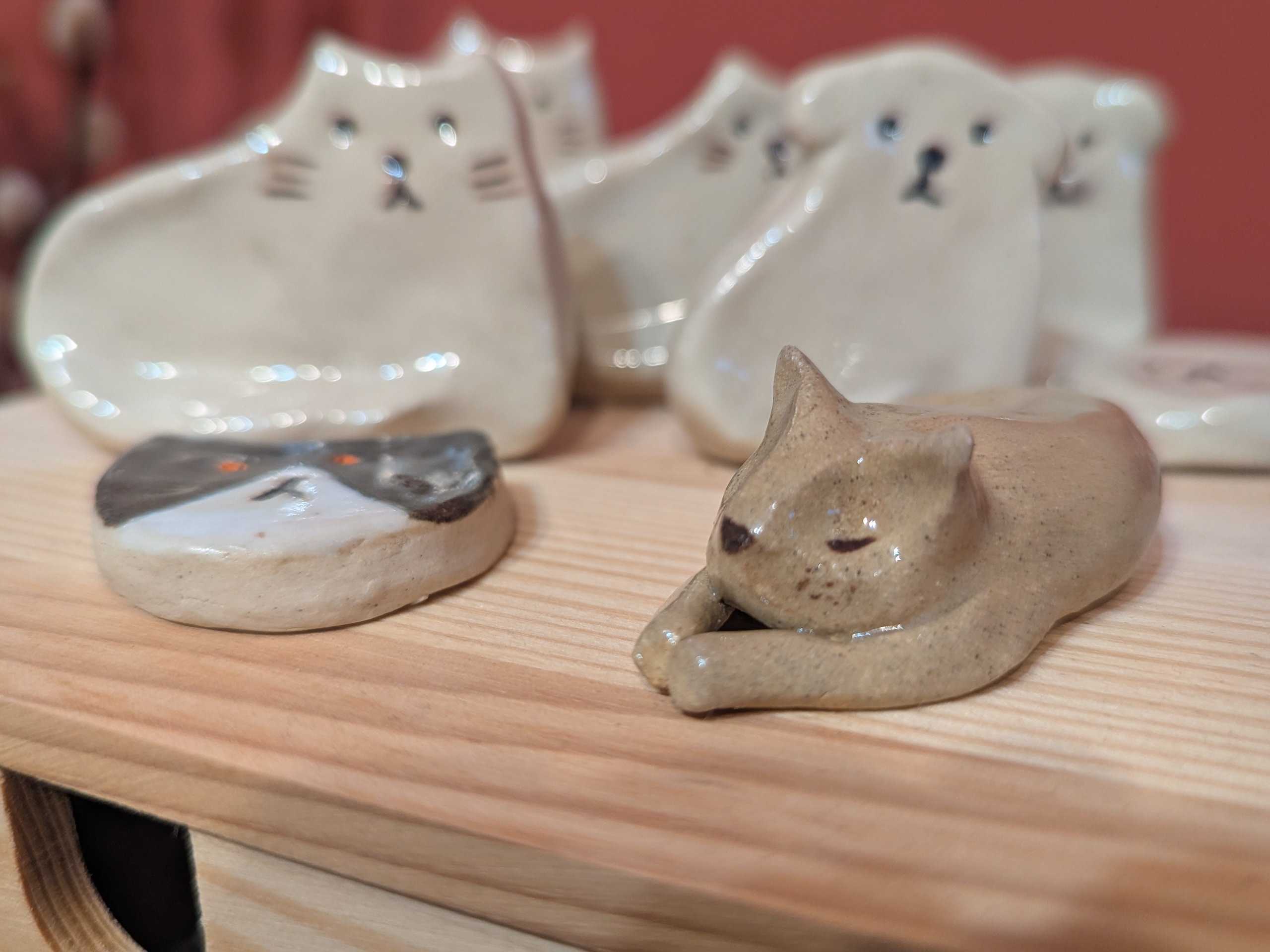 Collection of stoneware cats