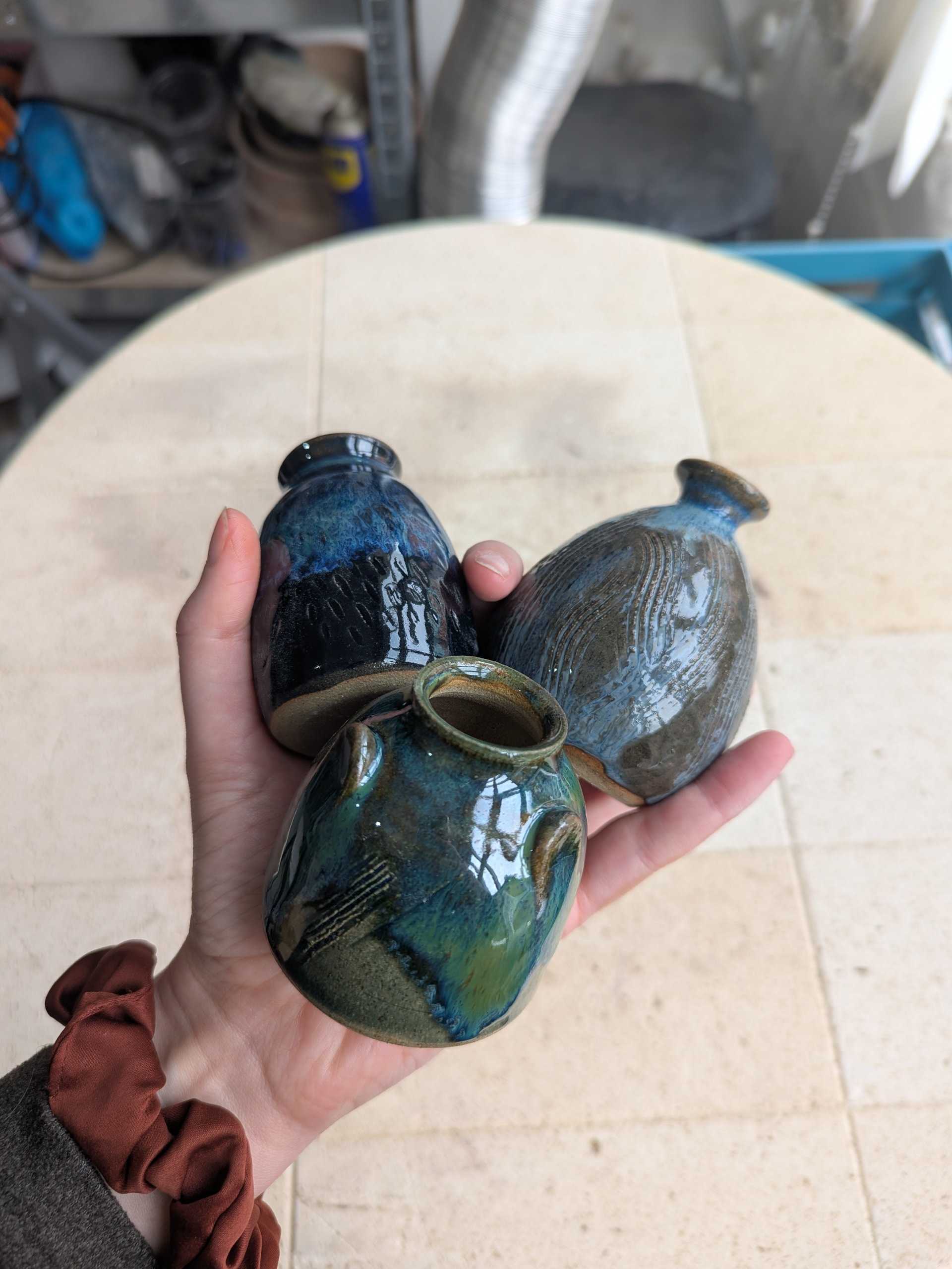 Small shiny bud vases