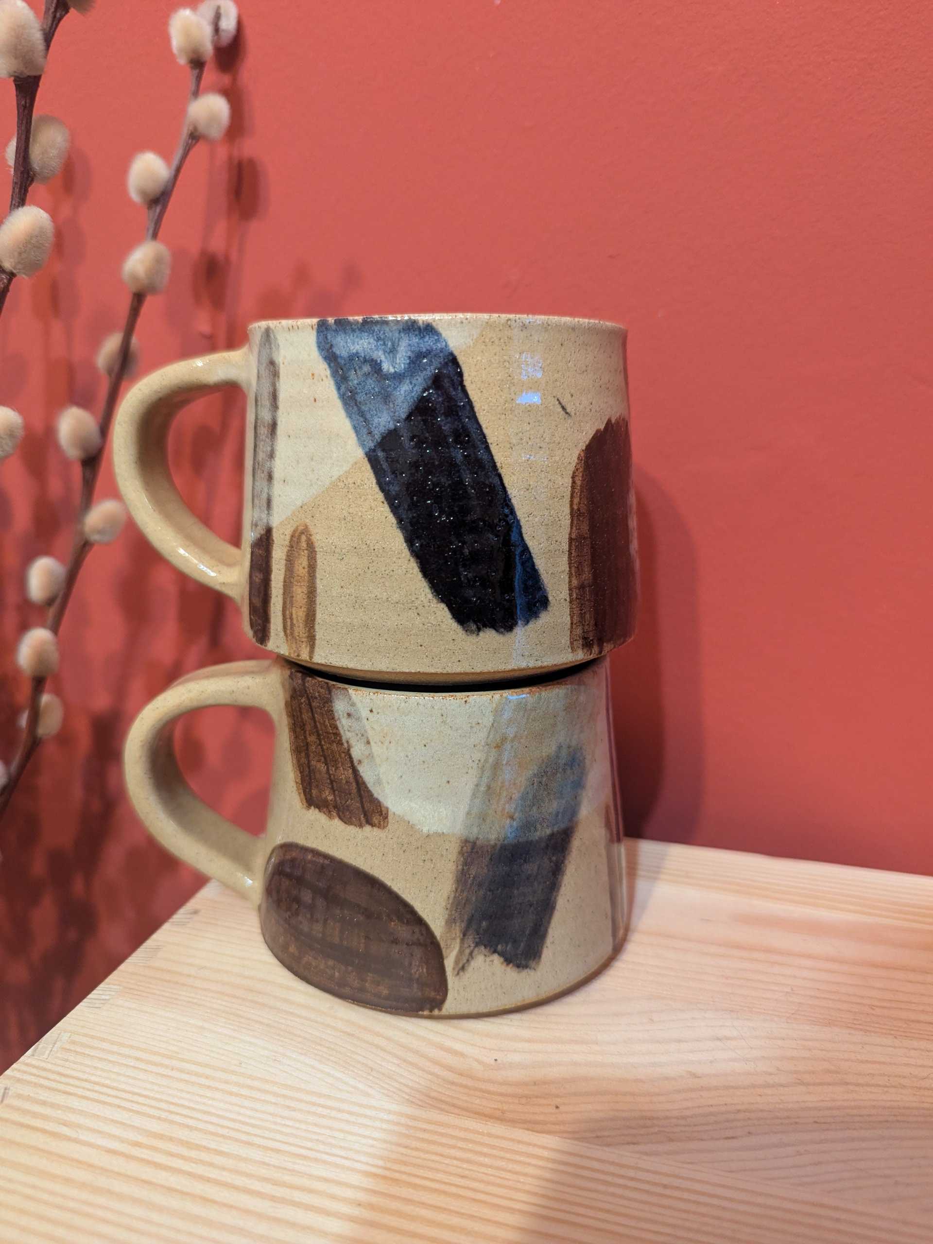 Mugs with underglaze stripes